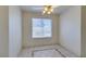 Bright dining area with tile flooring, a ceiling fan, and a window providing natural light at 698 S Racetrack Rd # 711, Henderson, NV 89015