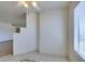 Dining area features neutral decor, stylish tile flooring, and a bright window view at 698 S Racetrack Rd # 711, Henderson, NV 89015