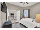 Bedroom with a view of the living room and ceiling fan at 7291 Purple Shadow Ave, Las Vegas, NV 89113