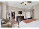 Main bedroom with large closet, sitting area and TV at 7291 Purple Shadow Ave, Las Vegas, NV 89113