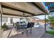 Patio furniture under covered patio with ceiling fan at 7291 Purple Shadow Ave, Las Vegas, NV 89113