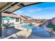 Relaxing pool with a rock waterfall feature at 7291 Purple Shadow Ave, Las Vegas, NV 89113