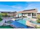 Inviting pool and spa with a covered patio at 7291 Purple Shadow Ave, Las Vegas, NV 89113