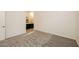 Bright bedroom with carpeted floor and access to bathroom at 746 Chopin Hills St, Henderson, NV 89011