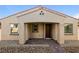 Single-story home with a covered porch and brick walkway at 746 Chopin Hills St, Henderson, NV 89011