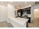 Modern kitchen with stainless steel appliances and white countertops at 746 Chopin Hills St, Henderson, NV 89011