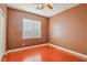 Spacious bedroom with hardwood floors and ceiling fan at 772 Crimson Peak Pl, Henderson, NV 89011