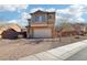 Two-story house with a brick driveway and attached garage at 772 Crimson Peak Pl, Henderson, NV 89011