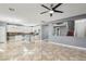 Kitchen with island, white cabinets, and granite countertops at 772 Crimson Peak Pl, Henderson, NV 89011