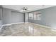 Spacious living room with tile flooring and ceiling fan at 772 Crimson Peak Pl, Henderson, NV 89011