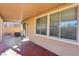 Covered patio with concrete flooring and access to the backyard at 772 Crimson Peak Pl, Henderson, NV 89011