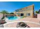 Inviting backyard with pool and firepit at 7978 Coronado Coast St, Las Vegas, NV 89139