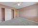 Bright bedroom featuring neutral walls and carpet at 7978 Coronado Coast St, Las Vegas, NV 89139