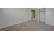 Simple bedroom with neutral walls, carpet, and closet at 7978 Coronado Coast St, Las Vegas, NV 89139