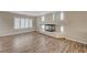 Living area with hardwood floors, a fireplace, and a view of the entryway at 7978 Coronado Coast St, Las Vegas, NV 89139