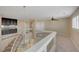 Open loft area with chandelier and access to the stairs at 7978 Coronado Coast St, Las Vegas, NV 89139