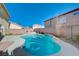 Relaxing kidney shaped pool in backyard at 7978 Coronado Coast St, Las Vegas, NV 89139