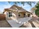 Backyard patio with pergola and gravel landscaping at 8016 Roundup Ridge St, Las Vegas, NV 89131