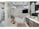 Spa-like bathroom with a soaking tub and large shower at 8104 Via Del Cerro Ct, Las Vegas, NV 89117