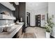 Elegant bathroom with double sinks and marble floors at 8104 Via Del Cerro Ct, Las Vegas, NV 89117