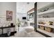 Spa-like bathroom with a freestanding tub and built-in shelving at 8104 Via Del Cerro Ct, Las Vegas, NV 89117