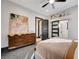 Bright bedroom with ensuite bathroom access and modern dresser at 8104 Via Del Cerro Ct, Las Vegas, NV 89117