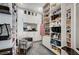 Large walk-in closet with custom shelving and seating at 8104 Via Del Cerro Ct, Las Vegas, NV 89117