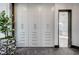 Bright white closet with built-in shelving and drawers at 8104 Via Del Cerro Ct, Las Vegas, NV 89117