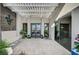 Elegant entryway with modern double doors and a covered walkway at 8104 Via Del Cerro Ct, Las Vegas, NV 89117