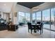 Game room with round table, chairs and sliding doors to backyard at 8104 Via Del Cerro Ct, Las Vegas, NV 89117