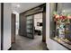 Stylish hallway with modern barn door leading to office at 8104 Via Del Cerro Ct, Las Vegas, NV 89117