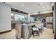 Modern kitchen with sleek cabinetry, large island, and high-end stainless steel appliances at 8104 Via Del Cerro Ct, Las Vegas, NV 89117