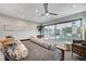 Main bedroom with sliding glass doors leading to backyard at 8104 Via Del Cerro Ct, Las Vegas, NV 89117