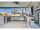 High-end outdoor kitchen with built-in appliances at 8104 Via Del Cerro Ct, Las Vegas, NV 89117