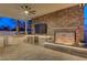 Stunning outdoor kitchen with fireplace and TV at 8104 Via Del Cerro Ct, Las Vegas, NV 89117