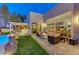 Outdoor patio with seating area and fire pit at 8104 Via Del Cerro Ct, Las Vegas, NV 89117