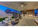 Spacious patio with outdoor kitchen and seating at 8104 Via Del Cerro Ct, Las Vegas, NV 89117