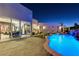 Inviting pool and patio area with fire pit and outdoor seating at 8104 Via Del Cerro Ct, Las Vegas, NV 89117