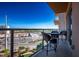 Balcony with patio furniture and stunning city views at 8255 Las Vegas Blvd # 619, Las Vegas, NV 89123