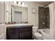 Well-appointed bathroom with shower and dark wood vanity at 8255 Las Vegas Blvd # 619, Las Vegas, NV 89123