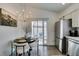 Modern dining area near kitchen with patio access at 8634 Lakota St, Las Vegas, NV 89123