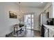 Bright dining area with patio access and a black table at 8634 Lakota St, Las Vegas, NV 89123