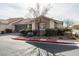 Single-story home with attached garage and nicely landscaped front yard at 8634 Lakota St, Las Vegas, NV 89123