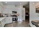 Modern kitchen with white cabinets, stainless steel appliances, and quartz countertops at 8634 Lakota St, Las Vegas, NV 89123