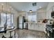 Bright kitchen with stainless steel appliances and white cabinets at 8634 Lakota St, Las Vegas, NV 89123