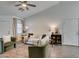 Living room featuring hardwood floors, a ceiling fan, and comfortable seating at 8634 Lakota St, Las Vegas, NV 89123