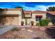 Well-maintained home with terracotta roof and landscaped front yard at 9016 Sundial Dr, Las Vegas, NV 89134