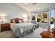 Main bedroom with bay window and view at 9016 Sundial Dr, Las Vegas, NV 89134