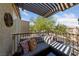 Relaxing balcony with covered seating area and neighborhood views at 9048 Rich Amethyst Ct, Las Vegas, NV 89149