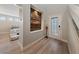 Bright and spacious entryway with modern wood-look floors at 9048 Rich Amethyst Ct, Las Vegas, NV 89149